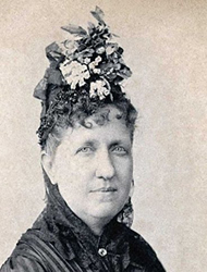 A woman with a hat on her head.